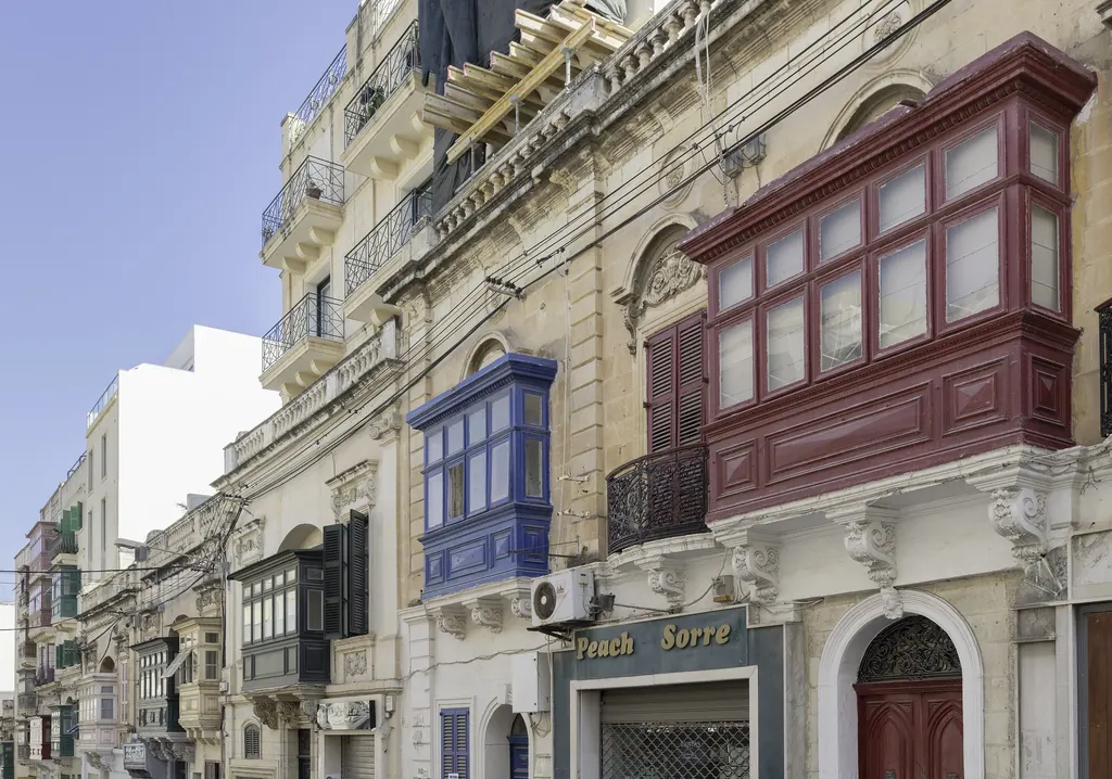 Townhouses with closed balconies in Sliema