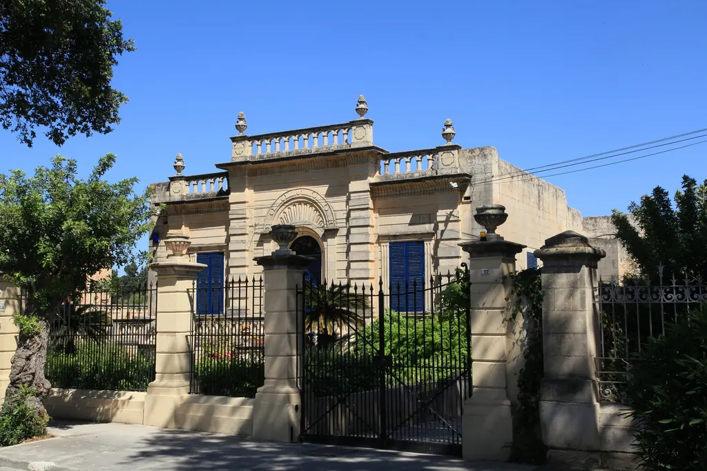 A villa gate on a quiet street in Attard