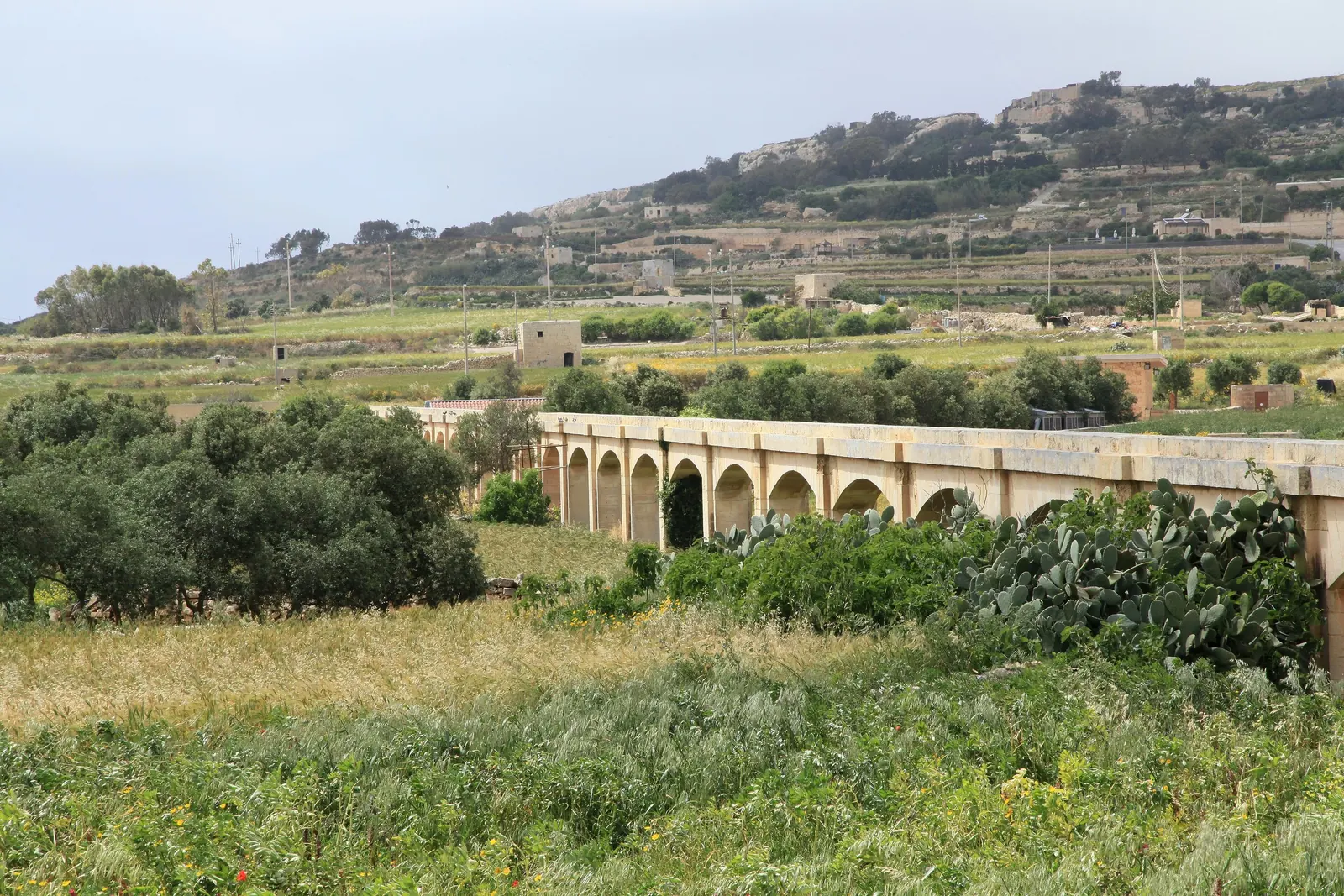 A historic aqueduct in the Maltese countryside