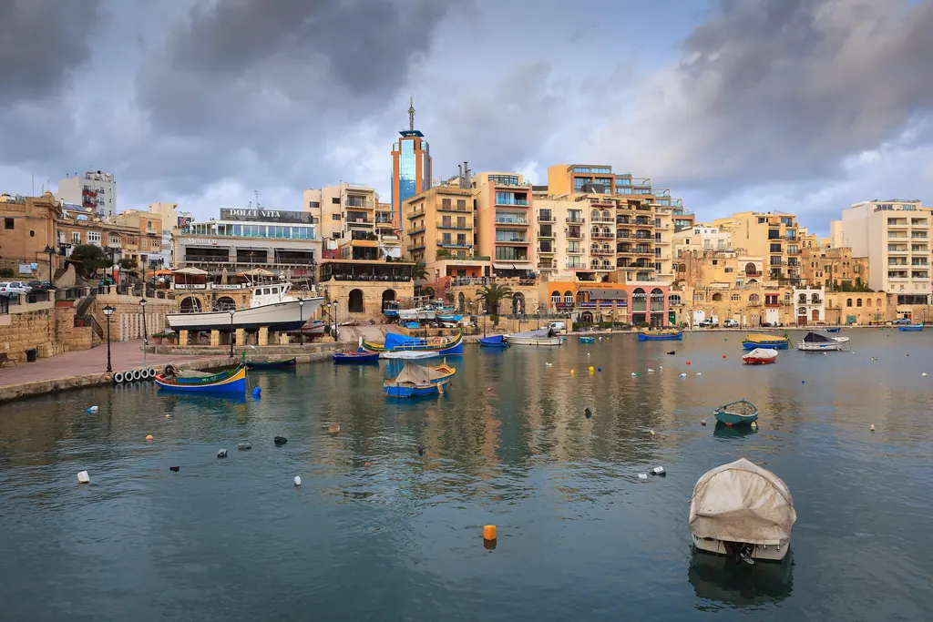 Spinola Bay in St Julian’s with its fishing boats and restaurants